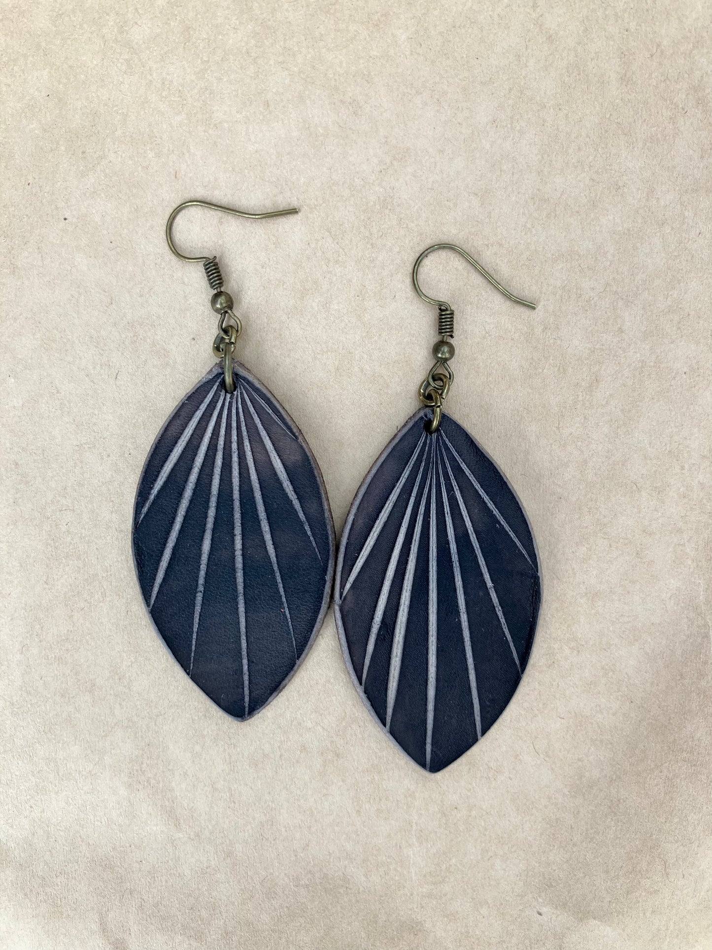 lightweight leather earrings with embossed lines; hypoallergenic, nickel free; antique brass; 3 inch high; handmade.