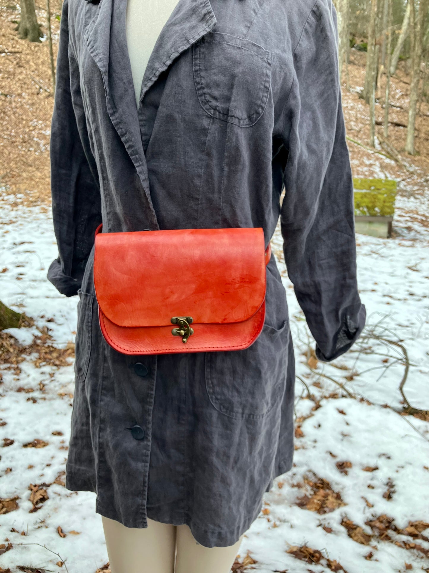 orange handmade leather bag/belt-bag hybrid with crossbody strap by Wilder Leather.