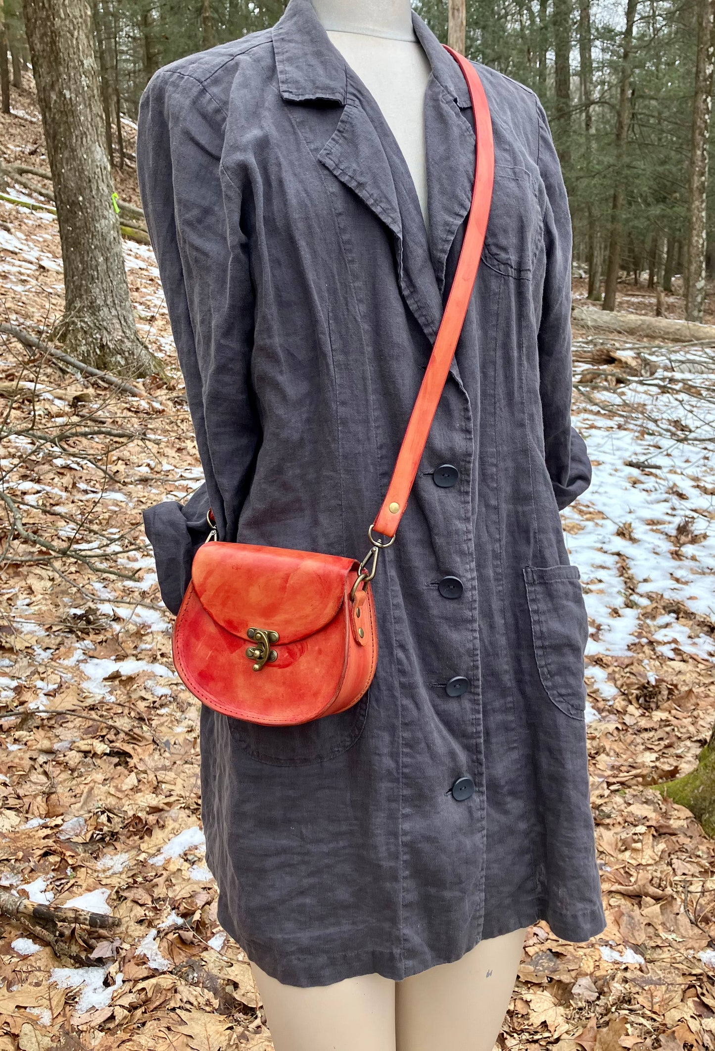 the johanna hybrid crossbody belt/bag in orange splatter