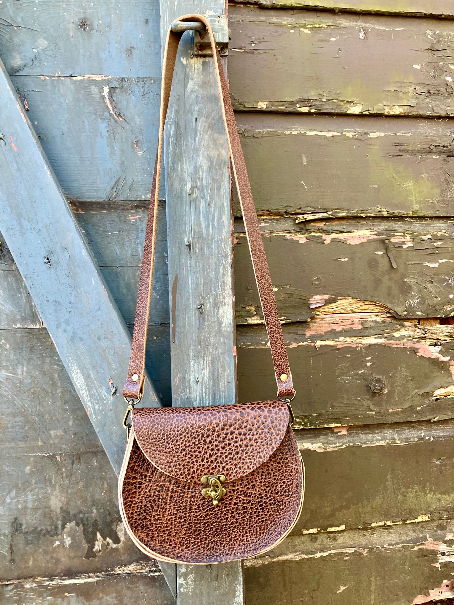 the sarah crossbody in pebbled brown leather