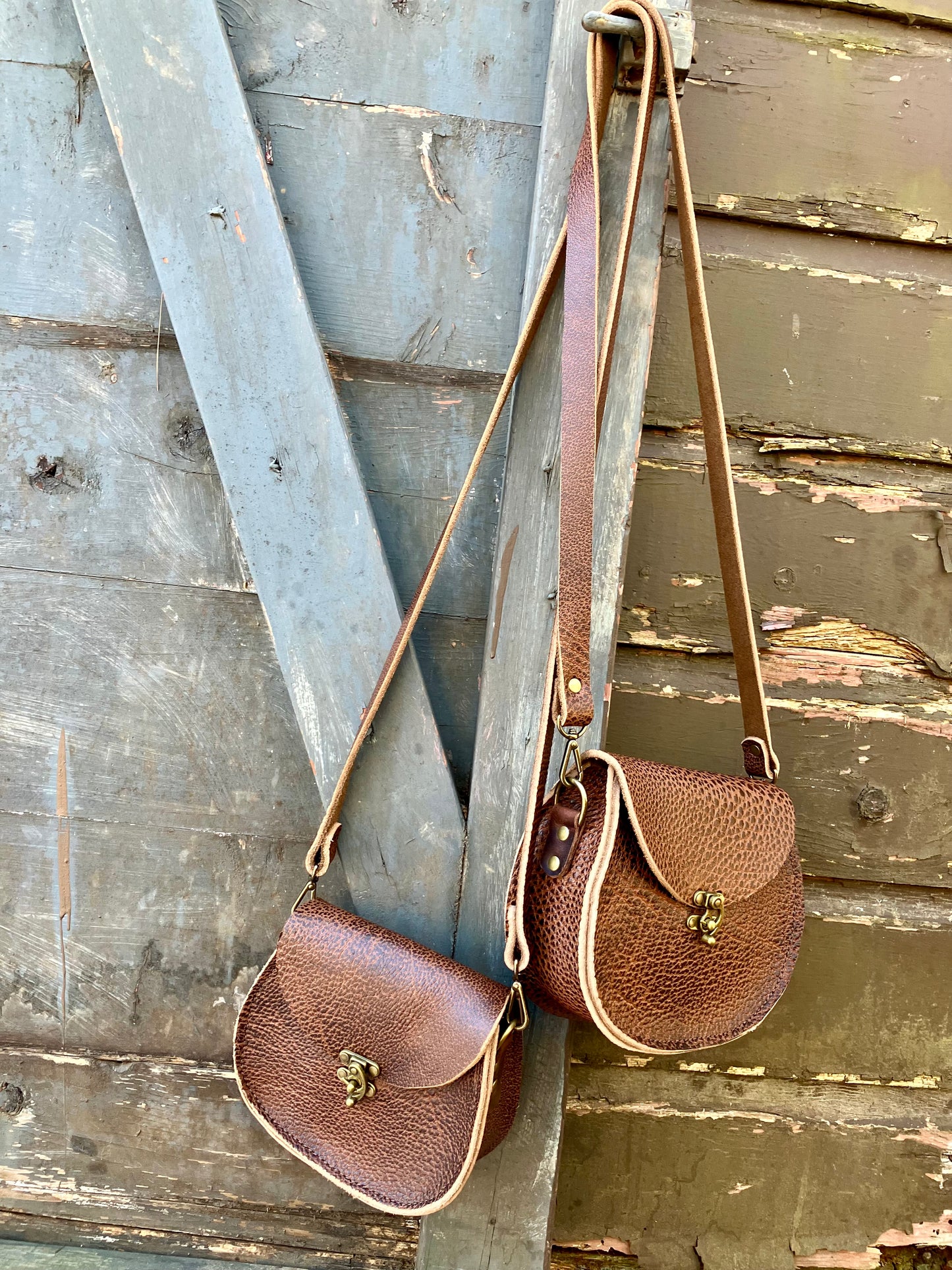 the sarah crossbody in pebbled brown leather