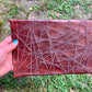 x cut leather clutch/pouch, slashed leather, handmade by Wilder Leather