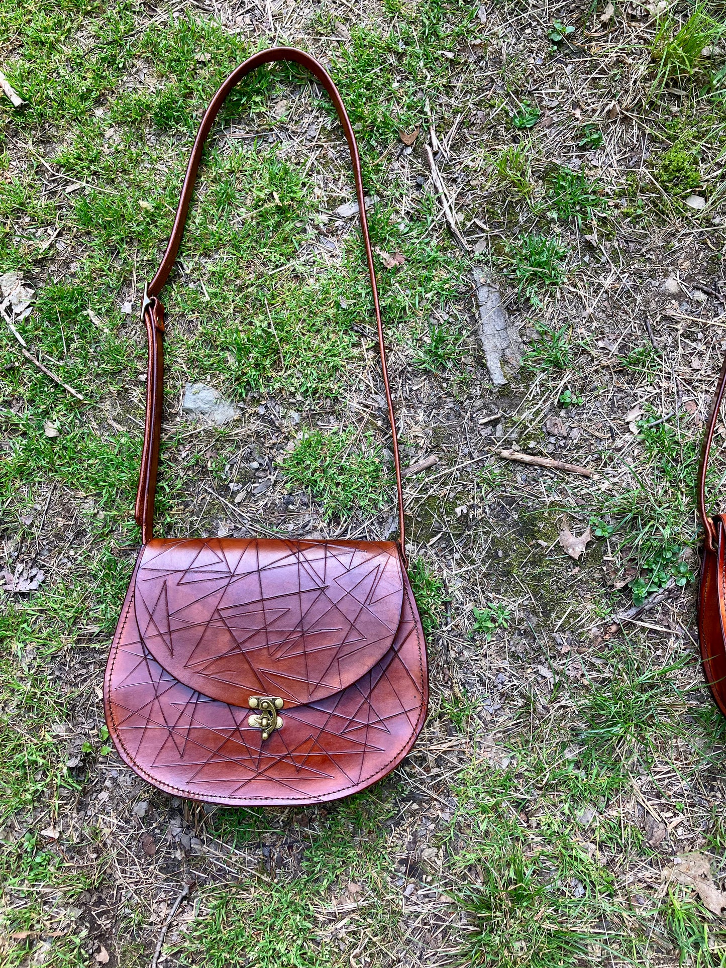 the cheryl, three available, in brown, orange, and purple slash
