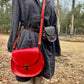 The Cheryl in red leather is the first of its kind. other bags (not red) shown for comparison. handmade by Wilder Leather in Woodstock, NY
