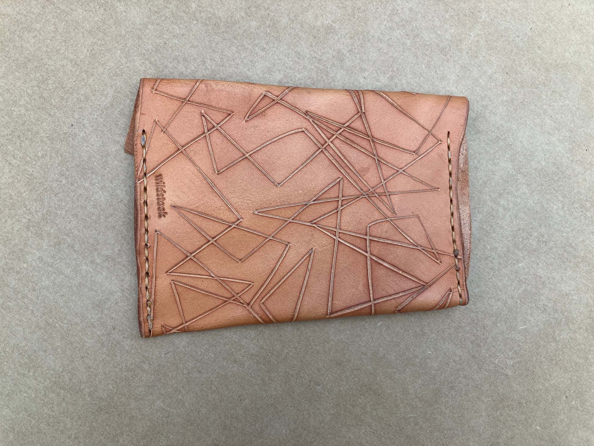 x cut pouch, embossed leather handmade by Wilder Leather