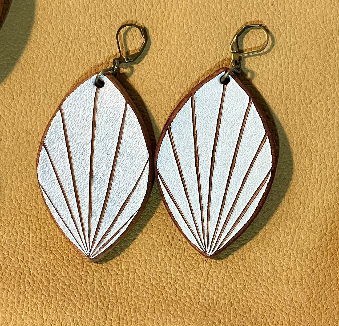 huge white leather earrings