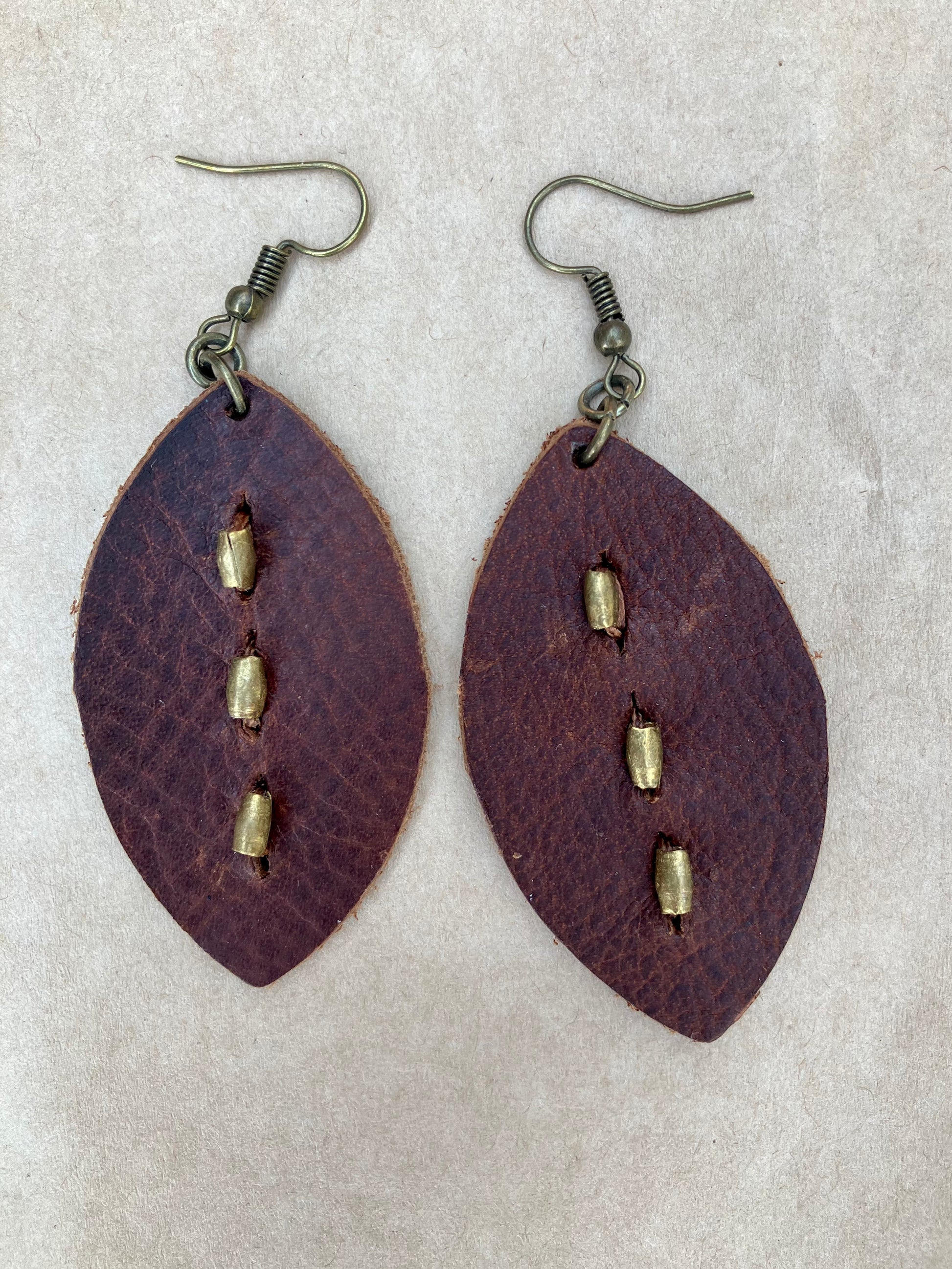 lightweight leather earrings; hypoallergenic, nickel free; antique brass; 3 inch high; handmade.