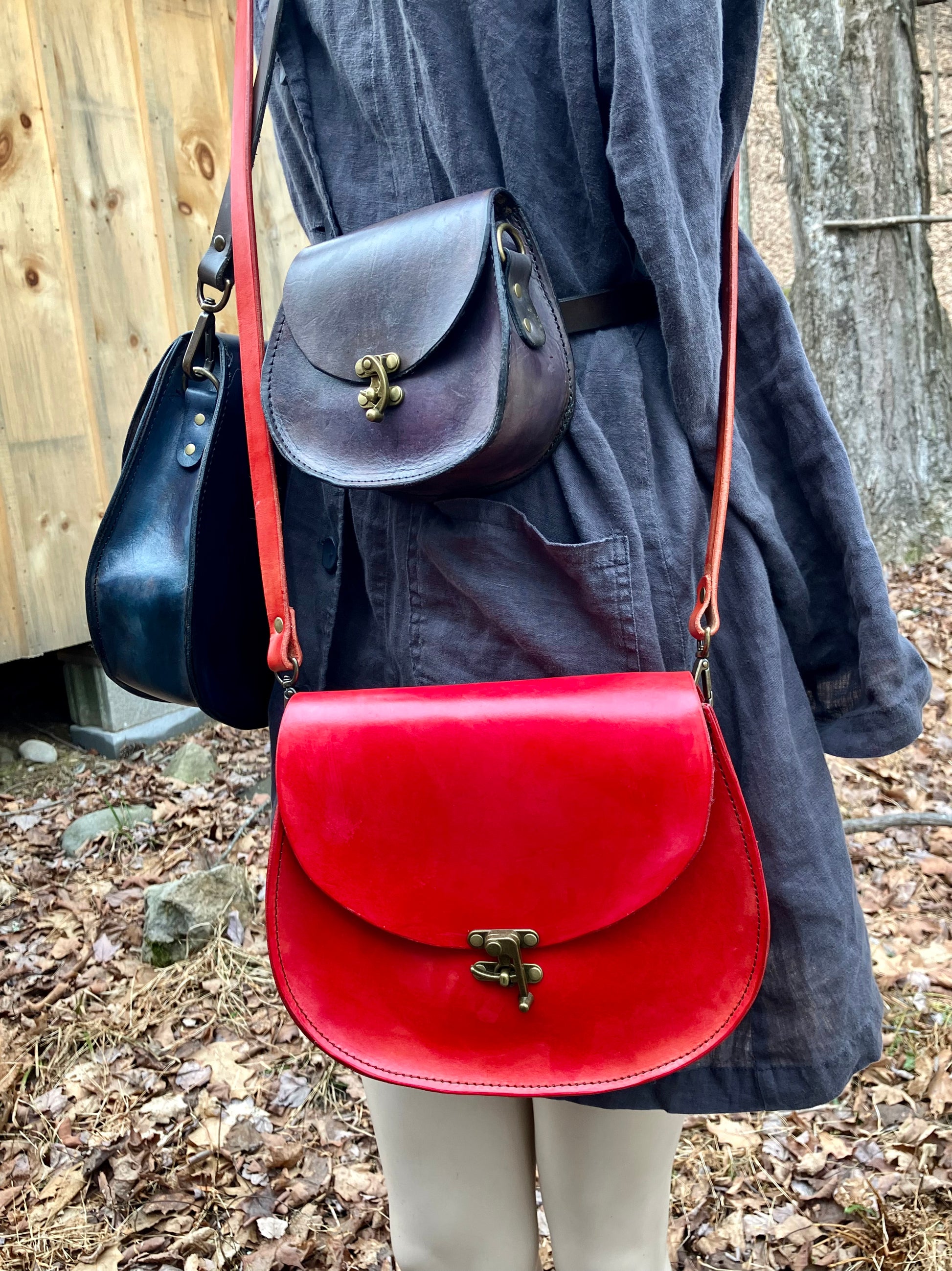 The Cheryl in red leather is the first of its kind. other bags (not red) shown for comparison. handmade by Wilder Leather in Woodstock, NY