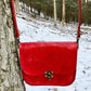 red slash embosssed handmade leather bag/belt-bag hybrid with crossbody strap by Wilder Leather.