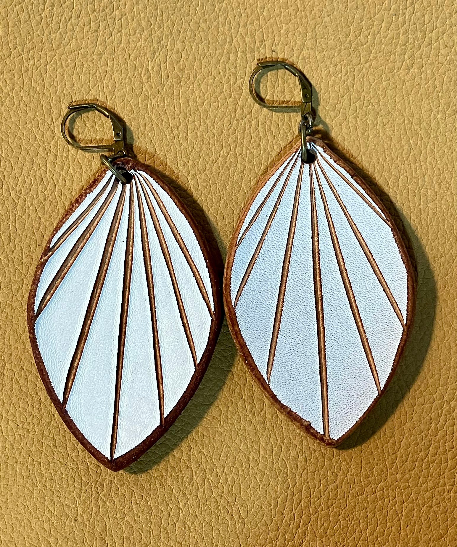 huge white leather earrings