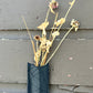 a wilder leather handcrafted leather air vase is perfect for dried flowers or other things you wish to suspend on the wall. 